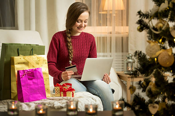 istock Happy woman with laptop 613013884