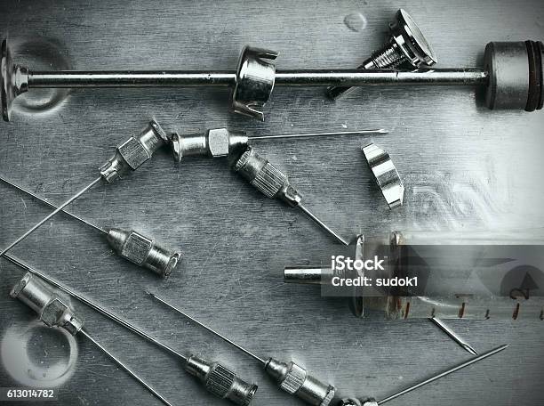 Obsolete Glass Syringe And Needles Stock Photo - Download Image Now - AIDS, Abstract, Abuse