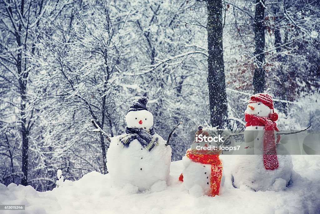 Snowmen Family Snowmen Family: Mother, Father and Son / Daughter Snowman Stock Photo