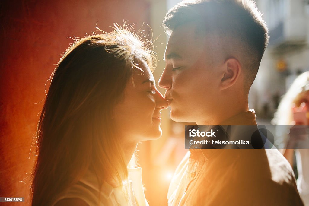 couple facing each other man and woman with a close view on the street Adult Stock Photo