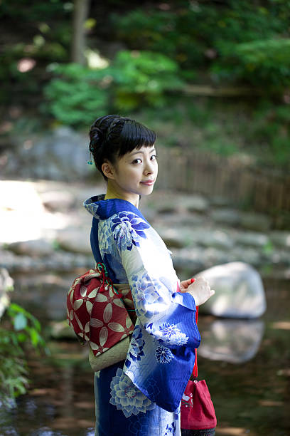 istock Japanese woman wearing yukata 613018310