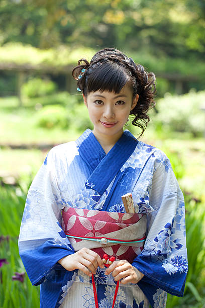istock Japanese woman wearing yukata 613019236