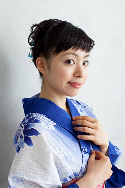 istock Japanese woman wearing yukata 613020232