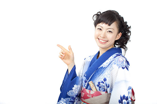 istock Japanese woman wearing yukata making gestures 613020724