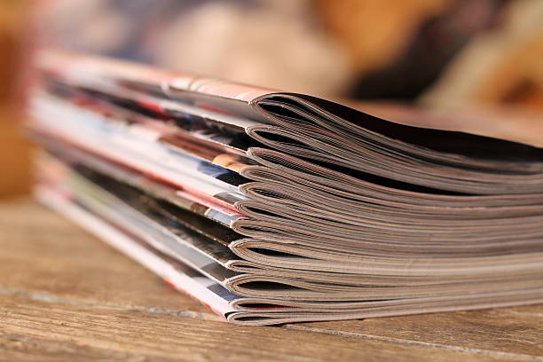 istock Magazines on the wooden table 613021152