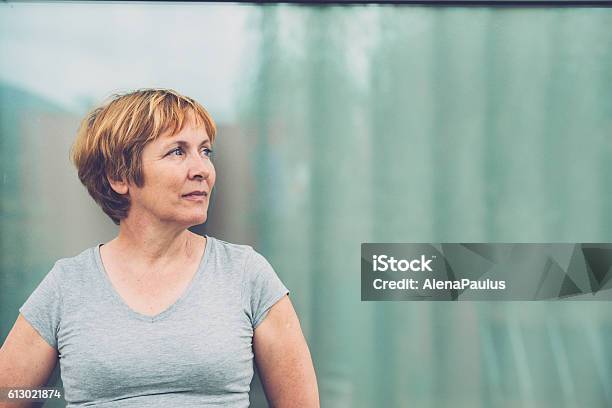 Independent Senior Woman Portrait Looking Away Front View Stock Photo - Download Image Now