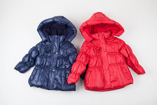 istock Two child warm jackets. Red and blue 613022330