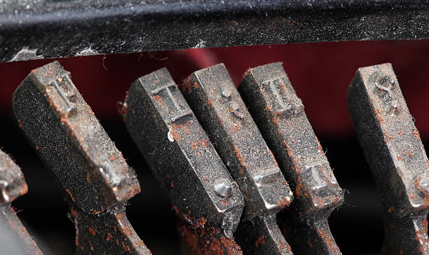 istock closeup of old typewriter buttons 613024134