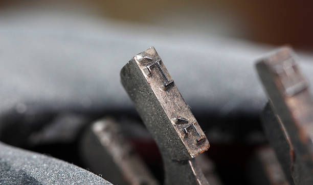 istock closeup of old typewriter buttons 613024176