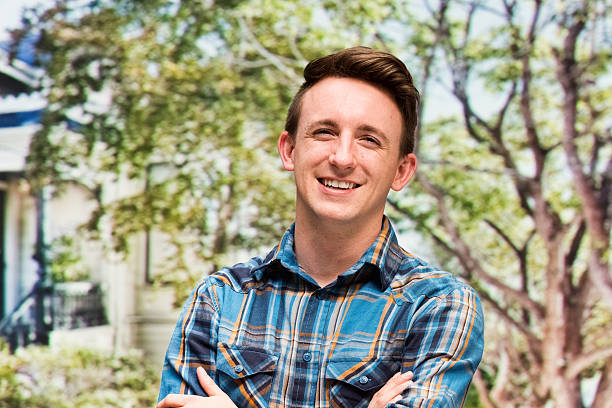 istock Smiling man standing outdoors 613024366