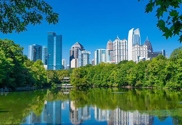 istock Atlanta Skyline Reflection in Piedmont Park 613027416