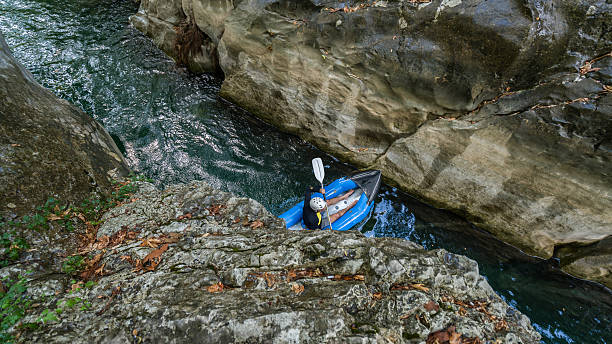 istock Two men in  life jackets on a rafting 613028894