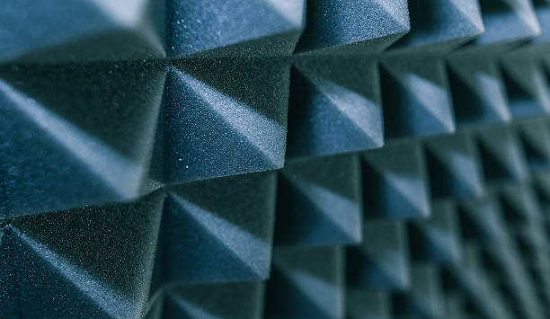 istock Dampening acoustical foam on recording studio wall 613031640