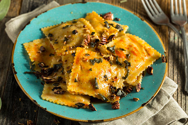 istock Homemade Pumpkin Ravioli with Butter Sauce 613033546