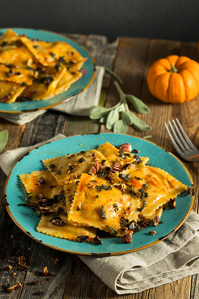 istock Homemade Pumpkin Ravioli with Butter Sauce 613033746