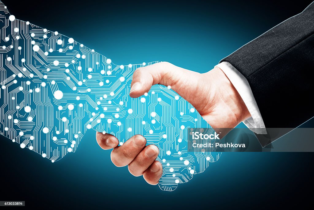 Digital handshake on blue background Businessman shaking digital partners hand on blue background Handshake Stock Photo