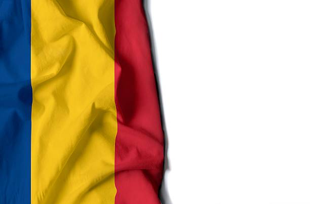 istock romania wrinkled flag, space for text 613033824