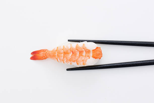 istock Nigiri sushi with boiled prawn on top 613037008