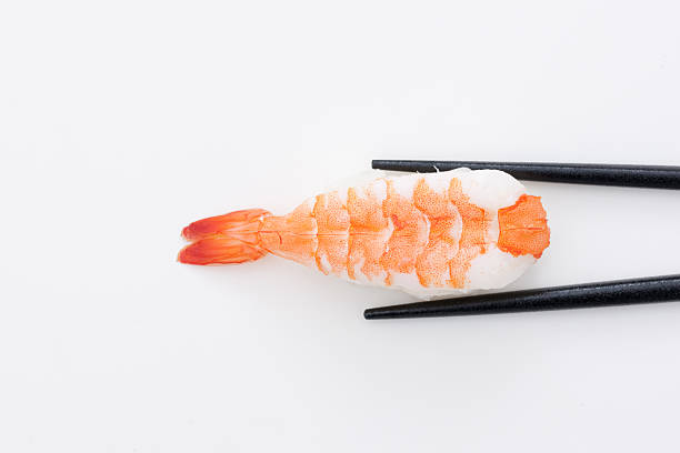 istock Nigiri sushi with boiled prawn on top 613037012