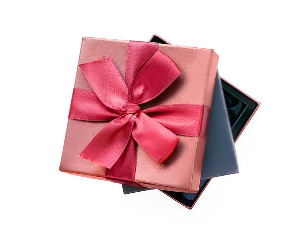 istock Gift boxes, black one in the brown one. 613037894