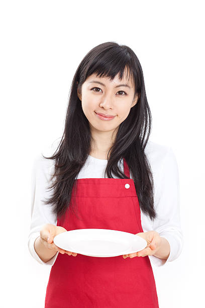 Japanese woman holding a white plate