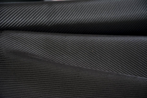 istock Carbon fiber composite raw material background 613038916
