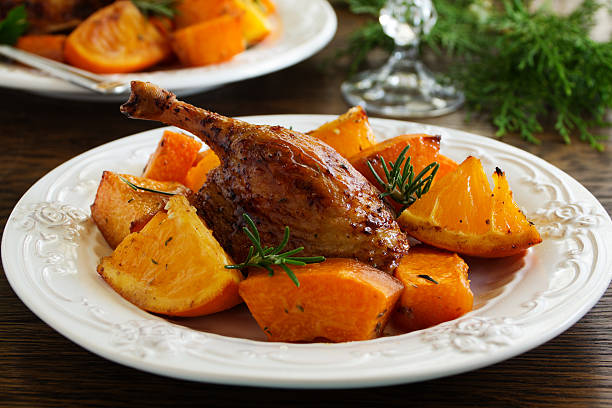 Roast duck with pumpkin and oranges.