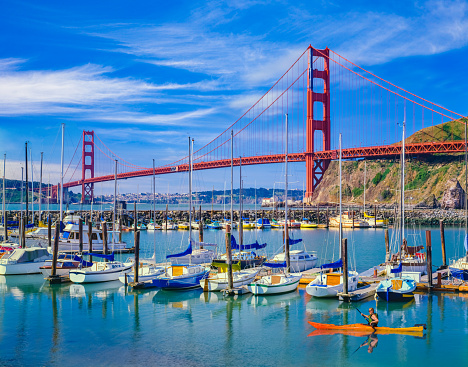 Calm harbor with sail boats and the Golden Gate Bridge, San Fransico, CA