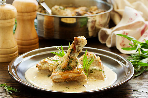 Delicious sauteed chicken with tarragon. Delicious sauteed chicken with tarragon. tarragon stock pictures, royalty-free photos & images