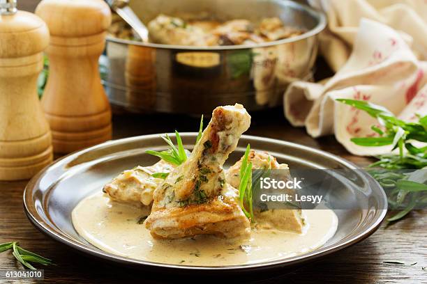 Delicious Sauteed Chicken With Tarragon Stock Photo - Download Image Now - Tarragon, Chicken Meat, Crockery