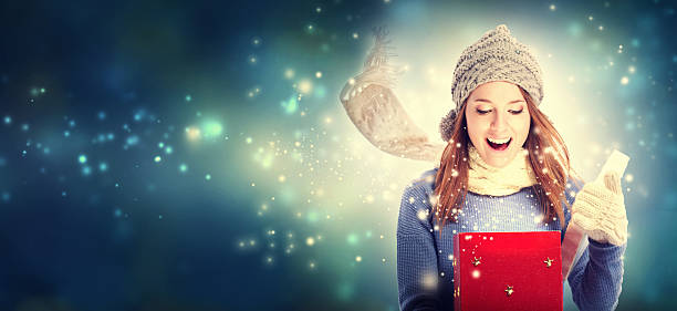 istock Happy young woman with Christmas present box 613041930