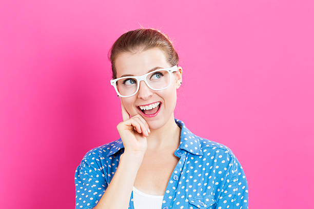 istock Young woman in a thoughtful pose 613042588