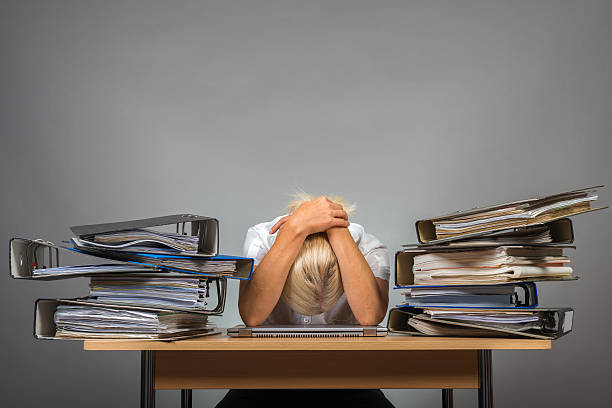 exhausted in office exhausted in office face down stock pictures, royalty-free photos & images