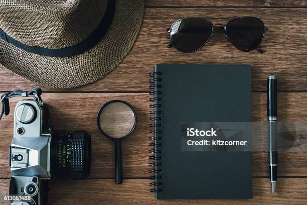 Black Notebook With Copyspace And Retro Camera Stock Photo - Download Image Now - Mystery, Black Color, Blank