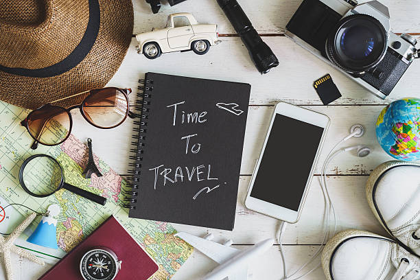 traveler's accessories and items with black notebook - personal organizer telephone group of objects diary imagens e fotografias de stock