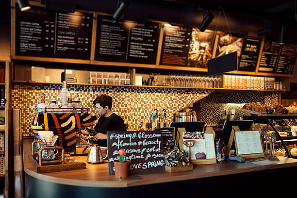 istock Barista at work in a coffee shop 613054024