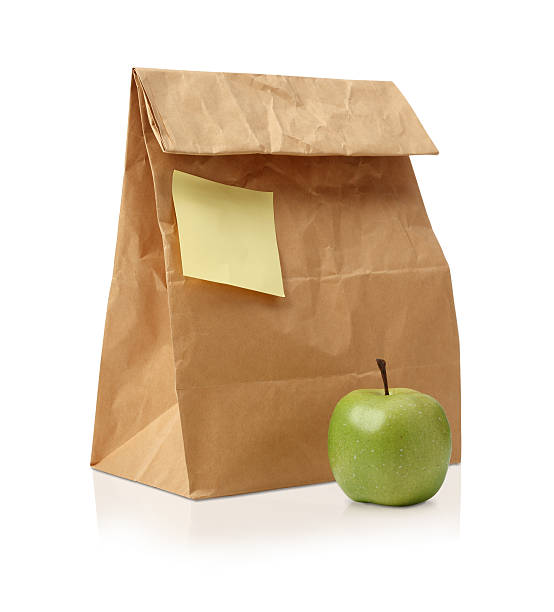 утилизировать коричневый бумажный мешок. - lunch bag apple brown стоковые фото и изображения