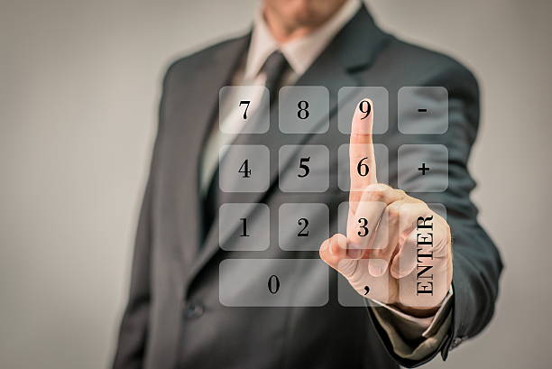 istock Photo of  Businessman pushing Numeric Virtual Keyboard 613055290
