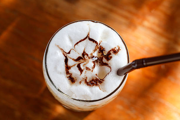 istock Ice cappuccino coffee on a wooden table 613059494