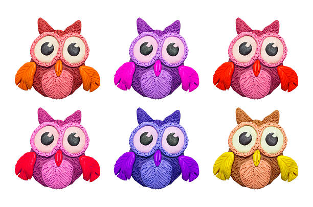 A set of colorful cartoon clay owls.