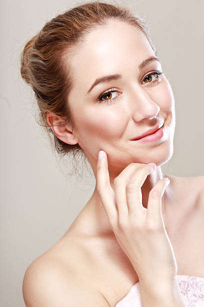 istock smiling young woman 613102550