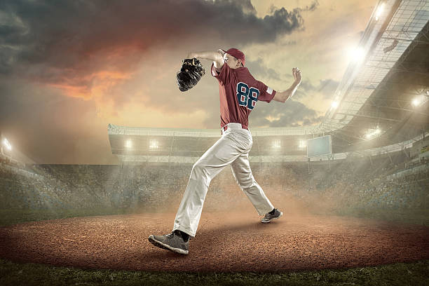 istock Baseball players in action on the stadium. 613103744