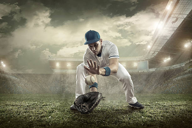 istock Baseball players in action on the stadium. 613103782