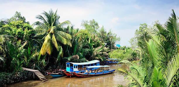 istock Wooden boats on Mekong 613103814
