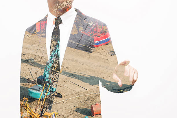 istock business man showing hand and finger composite with construction 613104090