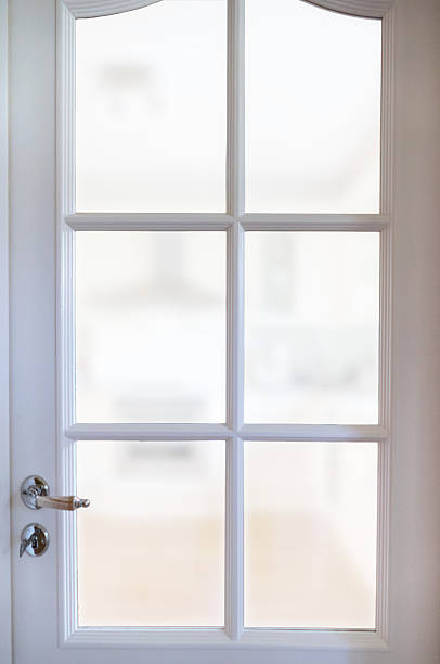 istock White wooden kitchen door with six panes 613104654