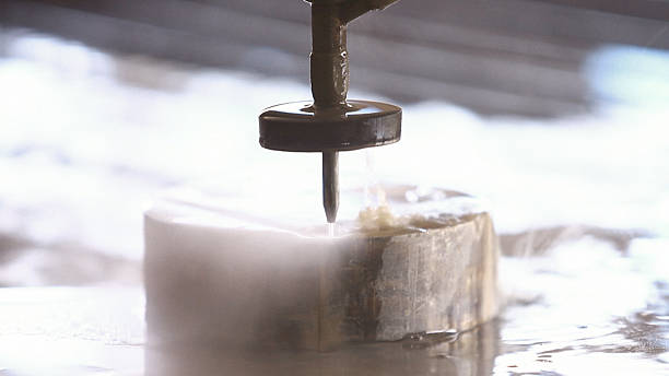 istock Waterjet metal cutter 613105758