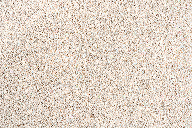 istock Dry yeast on top view texture background 613107386