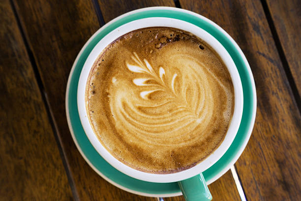 istock cup of coffee on desk 613107930