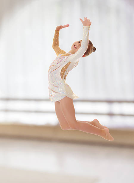 istock Little gymnast jumping 613108122